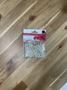 Vase filler gems found at a hobby store that look like little diamonds to help fill the pretend treasure chest.