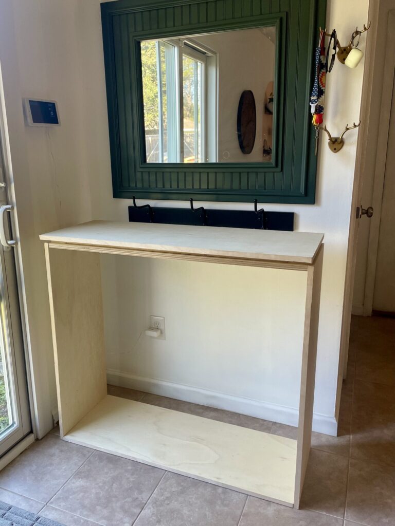Finished cabinet box frame from 3/4 inch plywood placed against a wall.